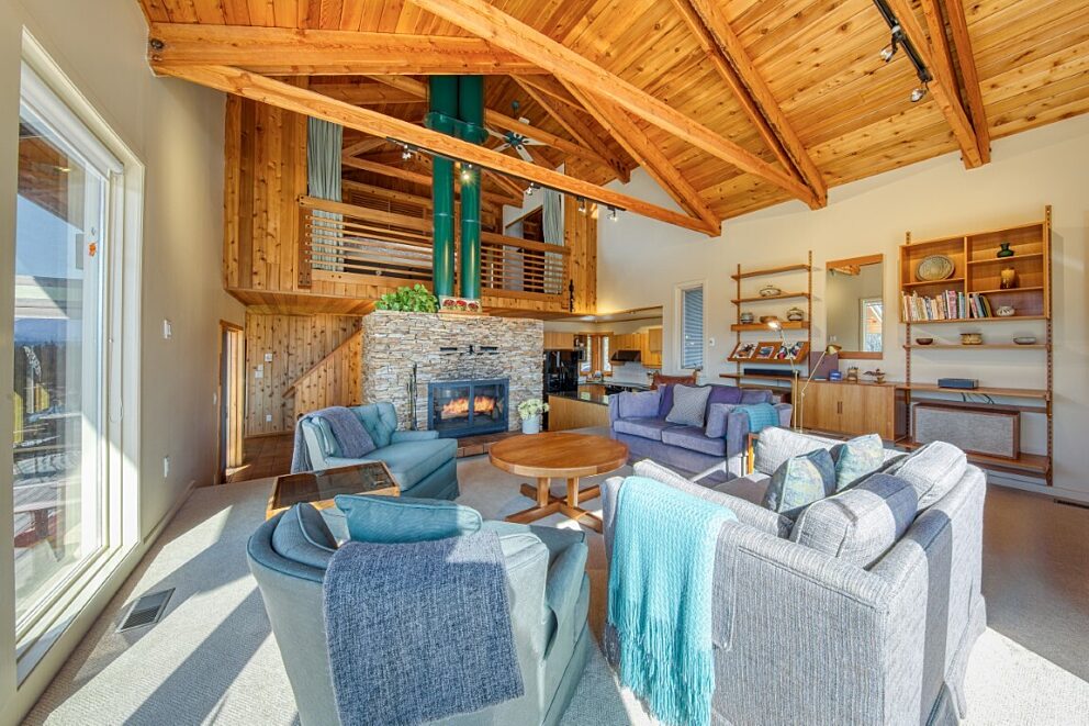 Wooden accents and a double-sided wood fireplace