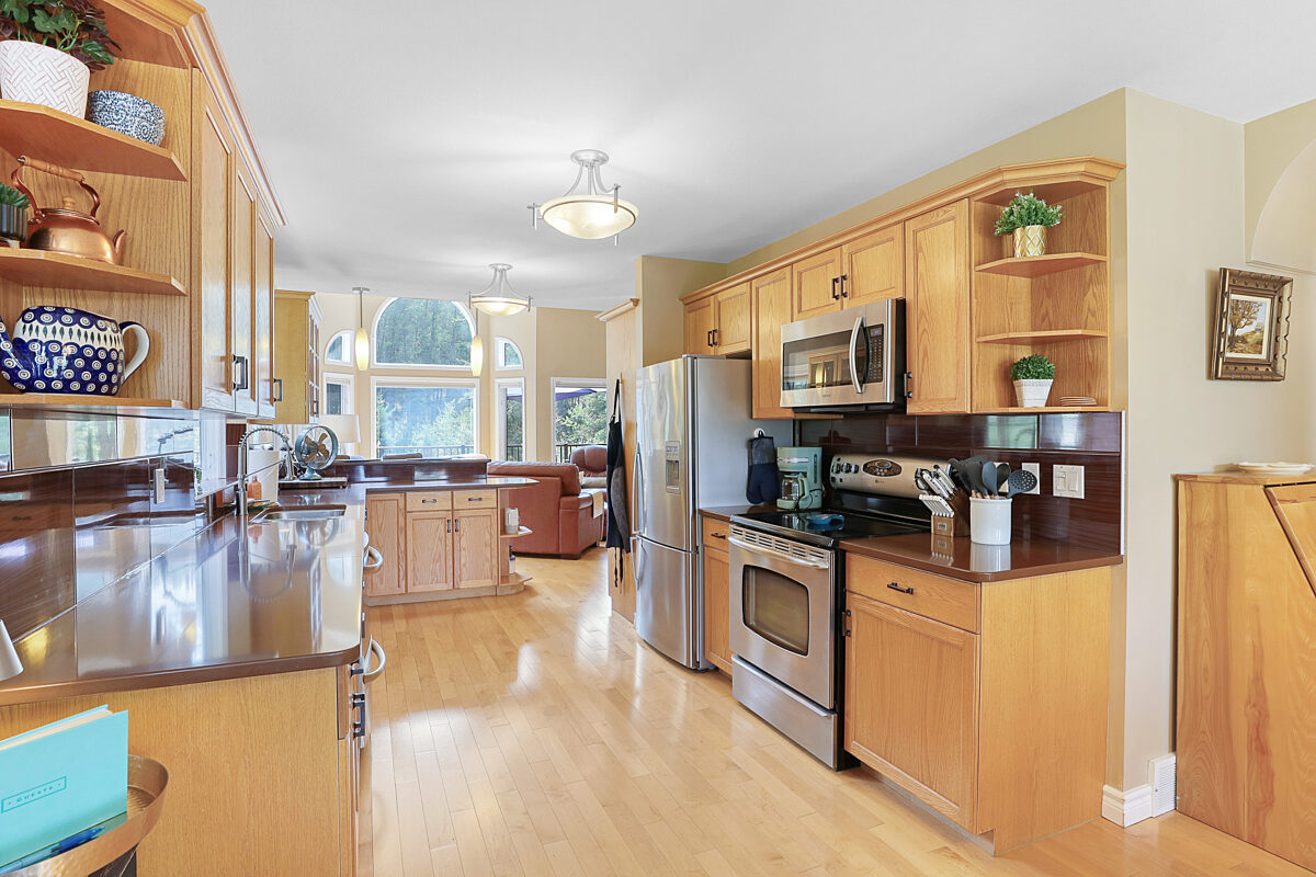 Galley kitchen, fully stocked with appliances