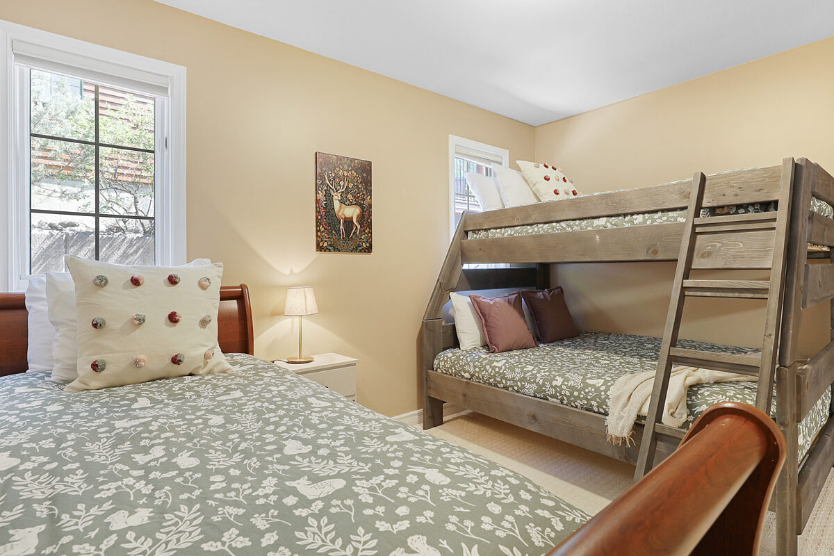 Lower level bedroom with a twin bed and bunk bed - sleeps 4