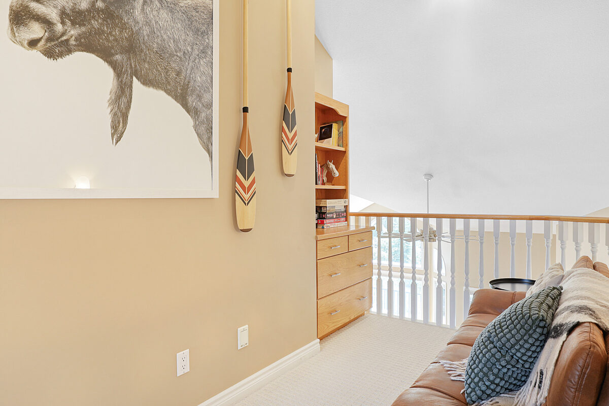 Loft area with books, games and twin sofabed