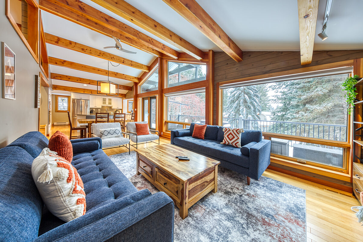 Main floor living room - open plan to dining and kitchen area