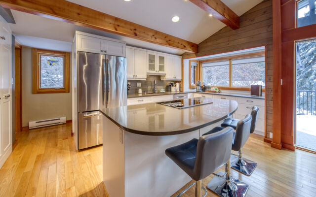 Main floor living room - open plan to dining and kitchen area