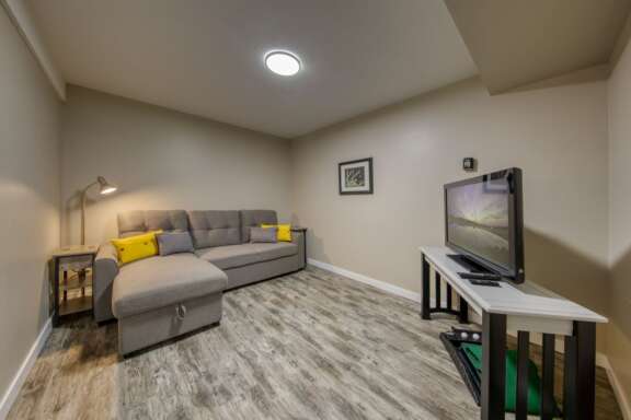 Den with Queen sofa-bed and Smart TV