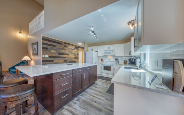 Cozy living room with Smart TV, gas fireplace and games