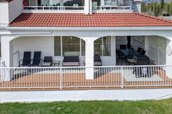 Deck overlooking golf course and mountains at Tee House 3BR-13 in Mountain View Villas