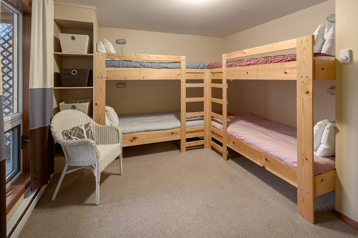 Bedroom with four bunk beds.