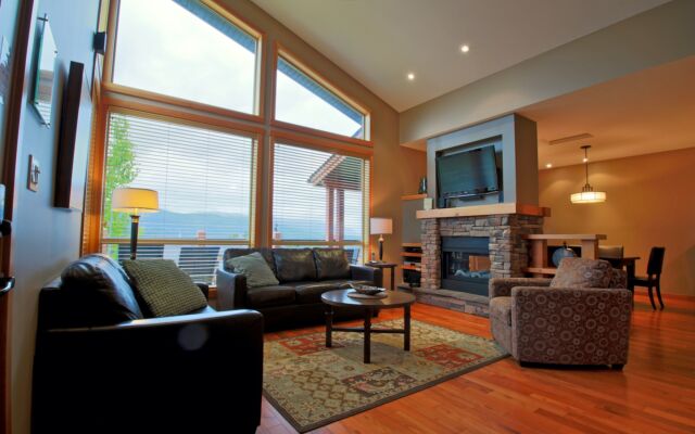 Spacious kitchen with black cabinets, stainless steel appliances, and counterspace.