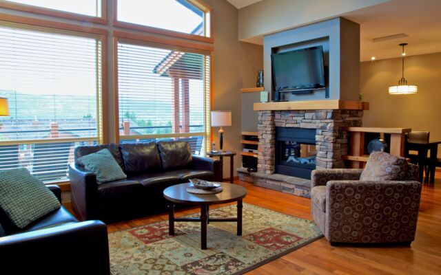 Spacious kitchen with black cabinets, stainless steel appliances, and counterspace.