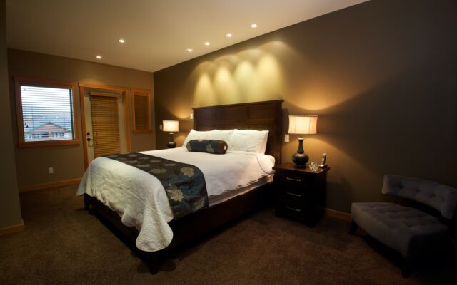 Spacious kitchen with black cabinets, stainless steel appliances, and counterspace.