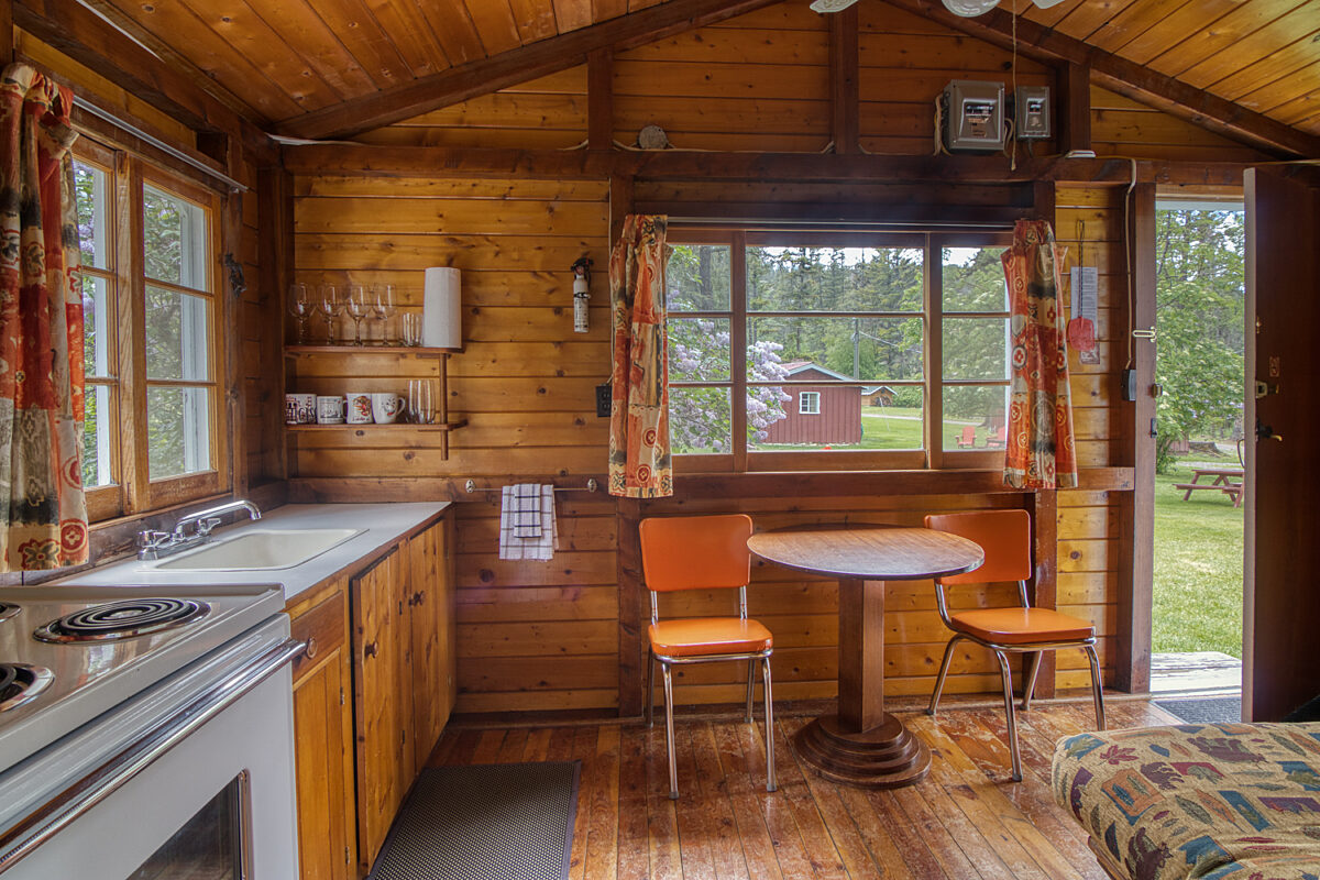 Kitchen area with wood panelling