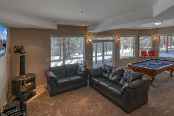 Recreation room-seating area with hide-a-bed, TV, gas fireplace