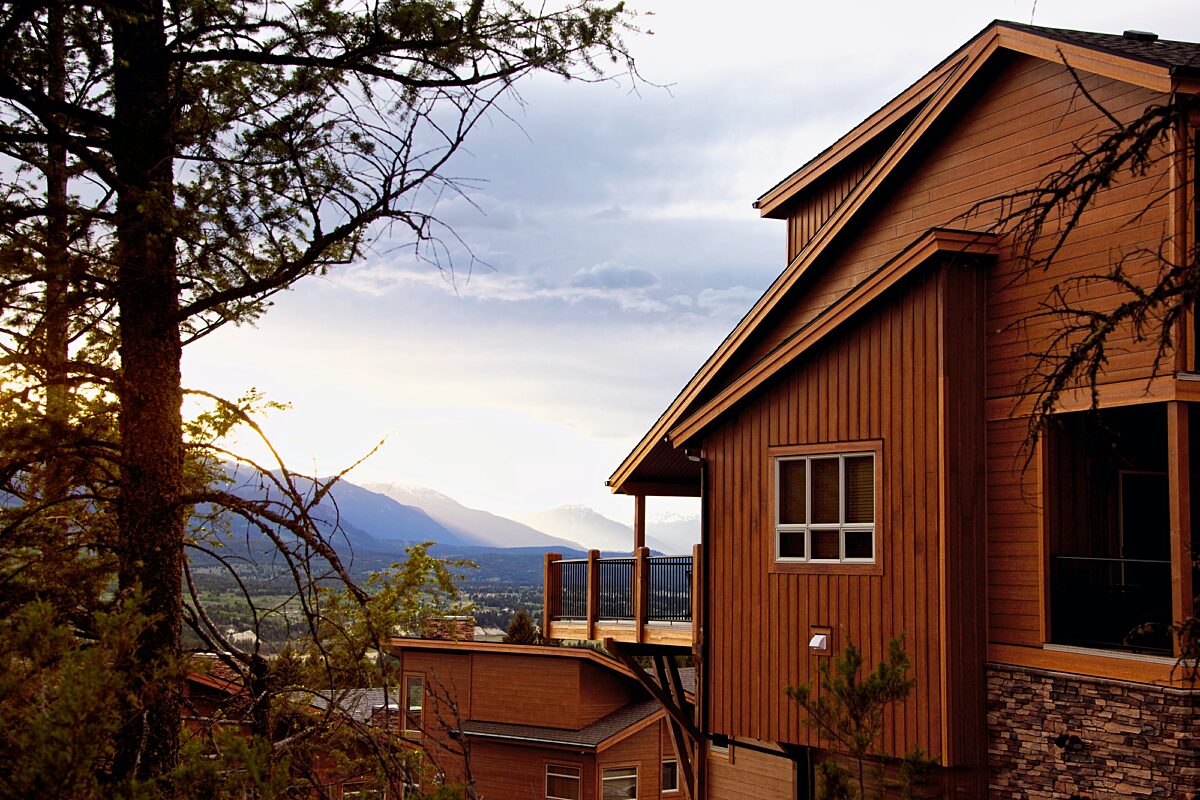 Exterior of townhome looking towards mountains.