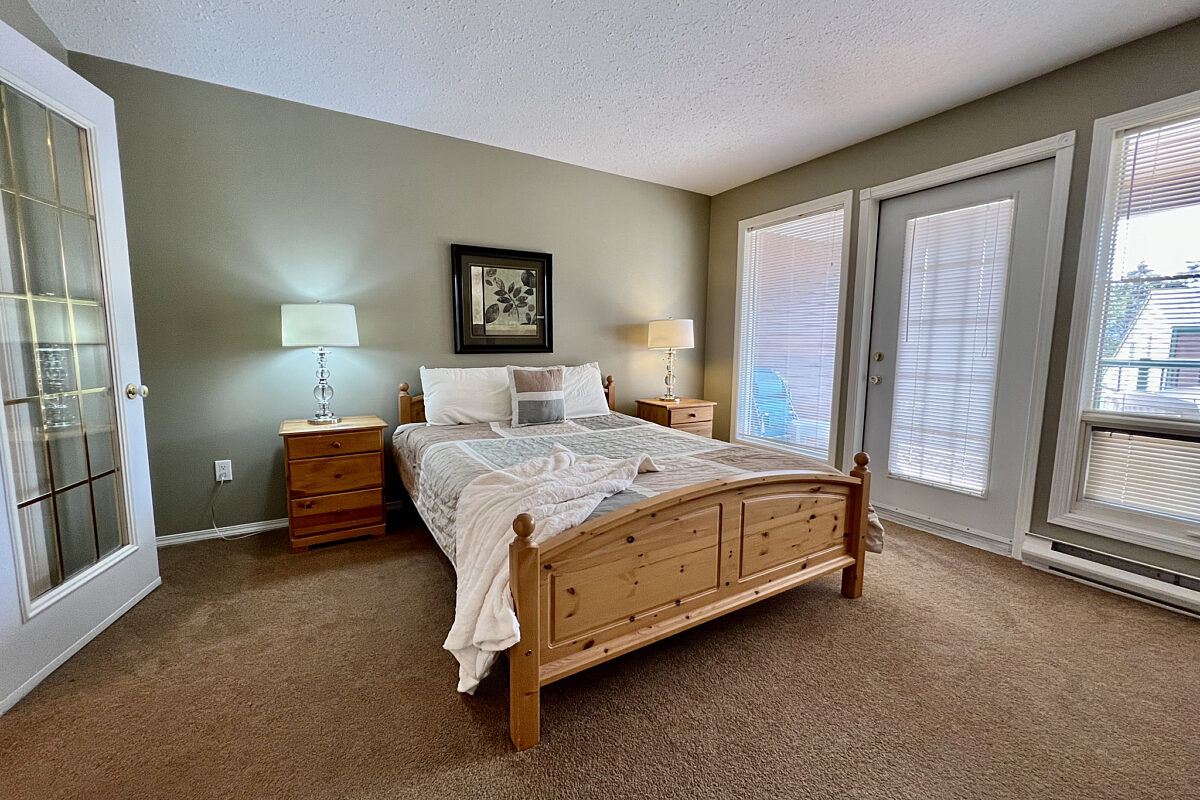 Master bedroom with queen bed