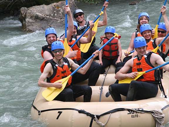 Whitewater rafting in a river.