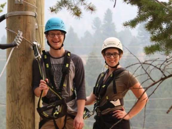 Couple ziplining