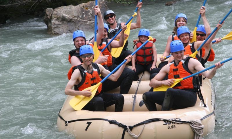 Whitewater rafting in a river.