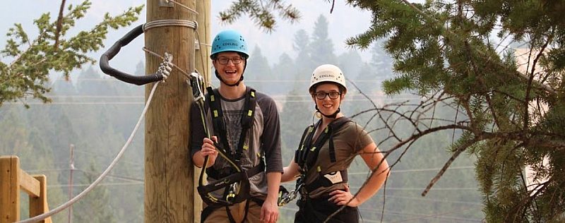 Couple ziplining