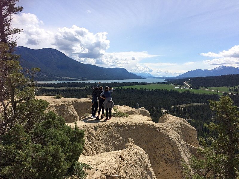 Hikers look out from the top of the hoodoos trail in Fairmont Hot Springs BC