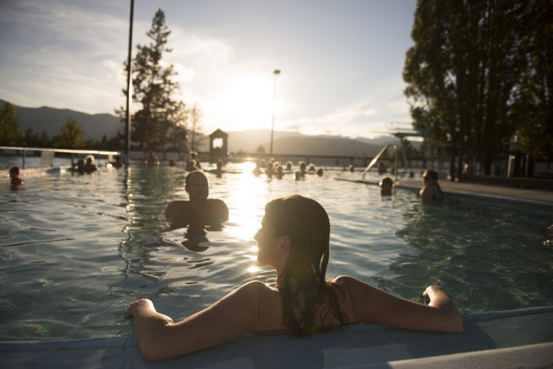 Woman soaks in the Fairmont Hot Springs pools