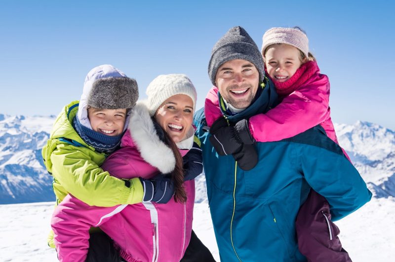 Family enjoys a day on the ski hill.