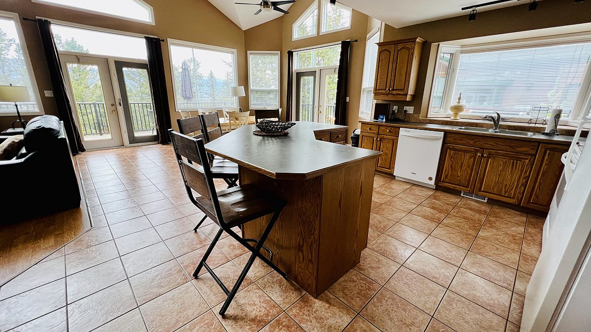 Spacious kitchen with window to the right.