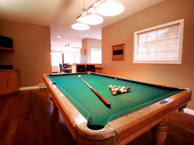 Recreation room with pool table.