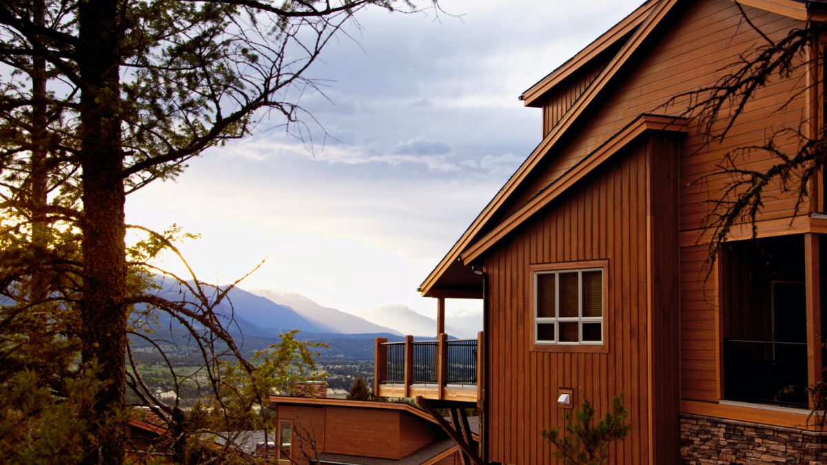 Exterior of townhome looking towards mountains.